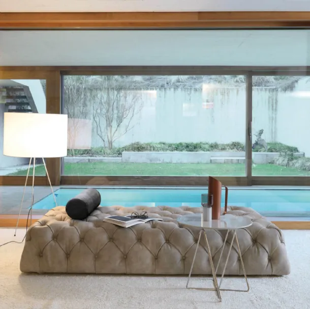 Rollking quilted leather linear sofa by Desirèe