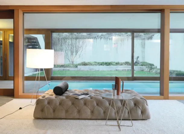 Rollking quilted leather linear sofa by Desirèe