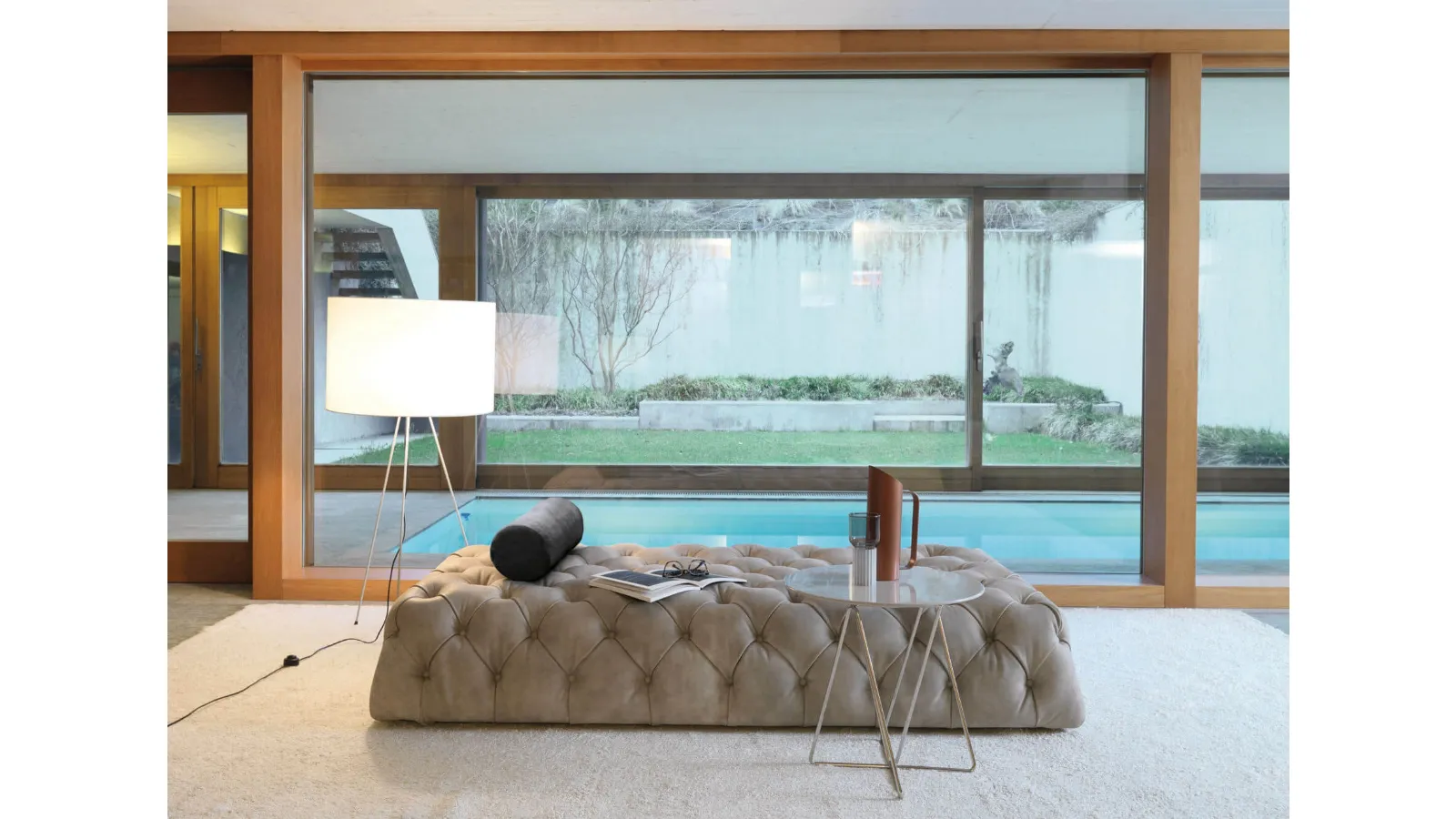 Rollking quilted leather linear sofa by Desirèe
