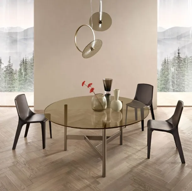 Agos round table with glass top and metal base by Fiam