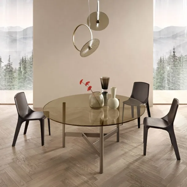 Agos round table with glass top and metal base by Fiam