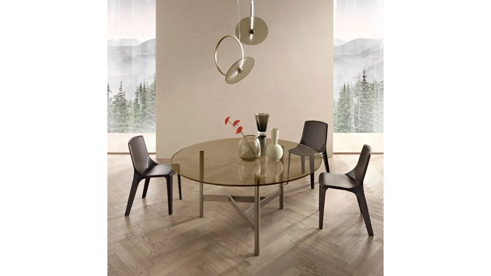 Agos round table with glass top and metal base by Fiam