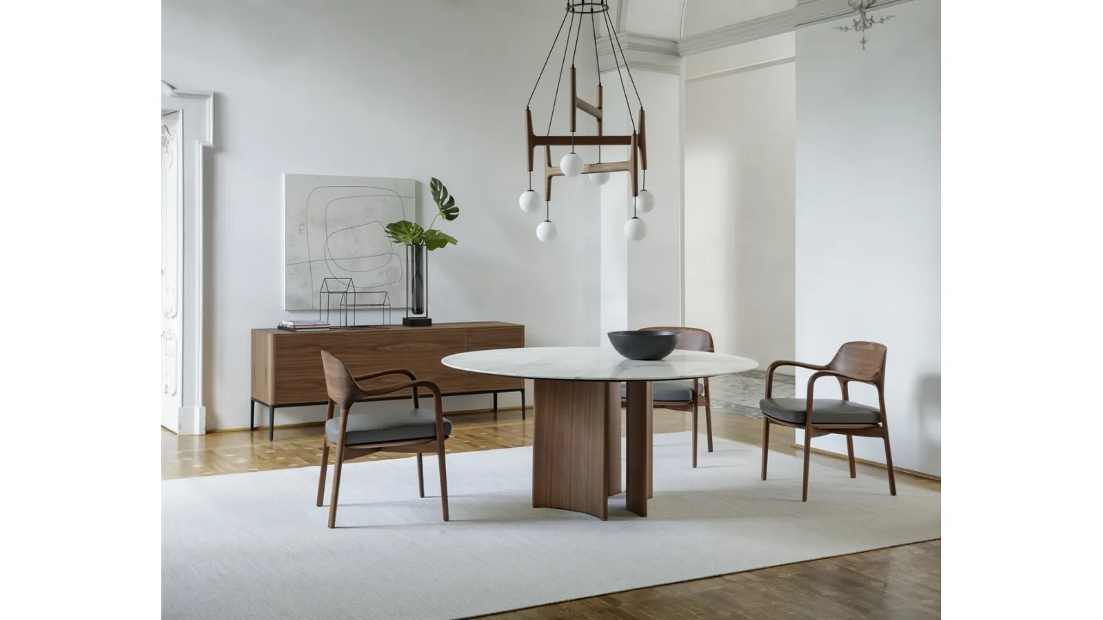 Round table with marble top and Canaletto walnut base Alan by Porada