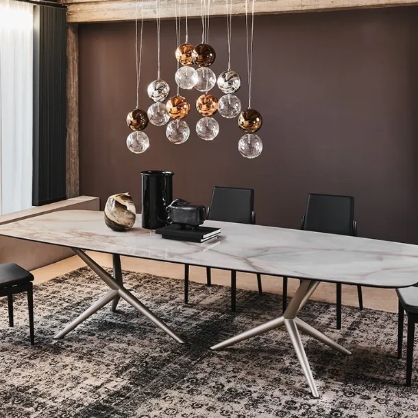 Atlantis table with steel base and Marmi Keramik ceramic top by Cattelan Italia