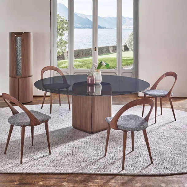 Bay round table with glass top by Porada