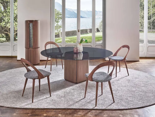 Bay round table with glass top by Porada