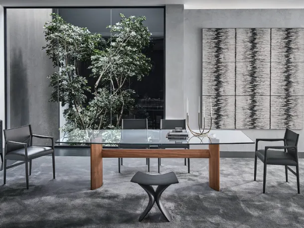 Table with a glass top and two half-moon bases in Canaletto walnut, joined by a central wooden beam from Porada's Beam collection