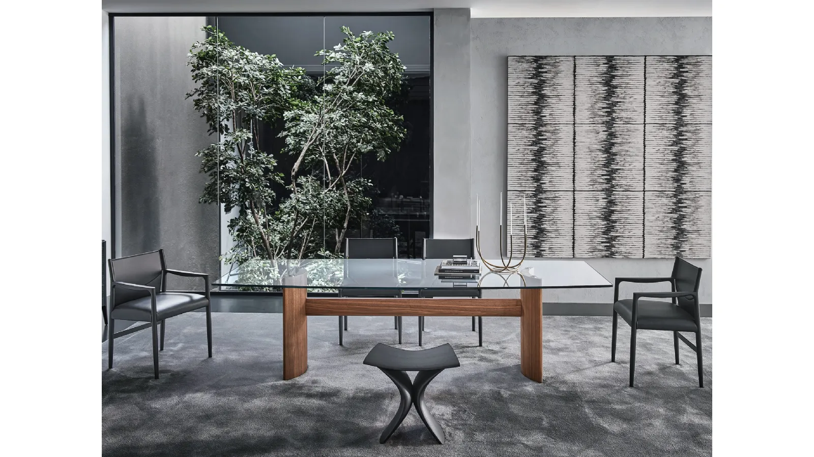Table with a glass top and two half-moon bases in Canaletto walnut, joined by a central wooden beam from Porada's Beam collection