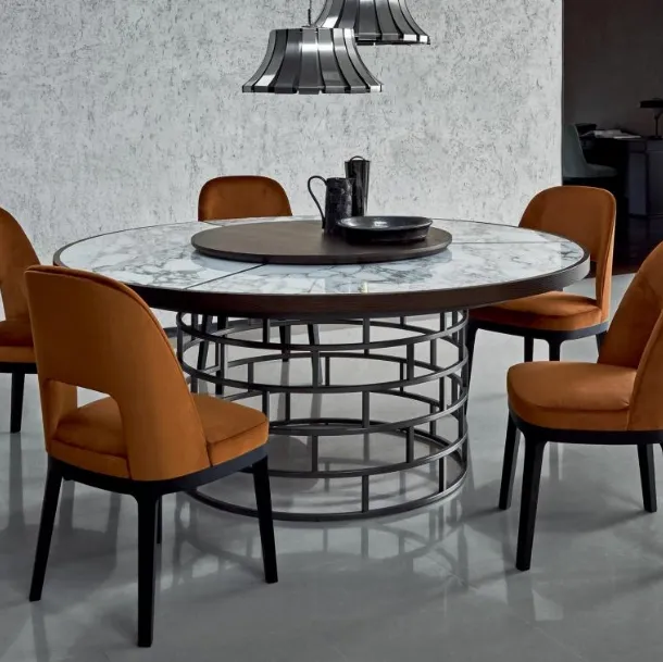 Round table with marble and Crown wood top by Flexform