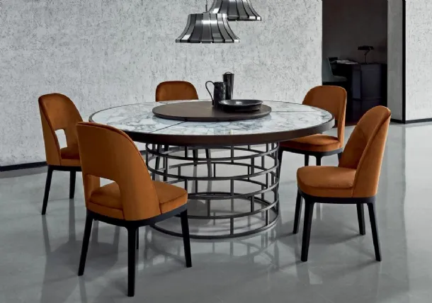 Round table with marble and Crown wood top by Flexform