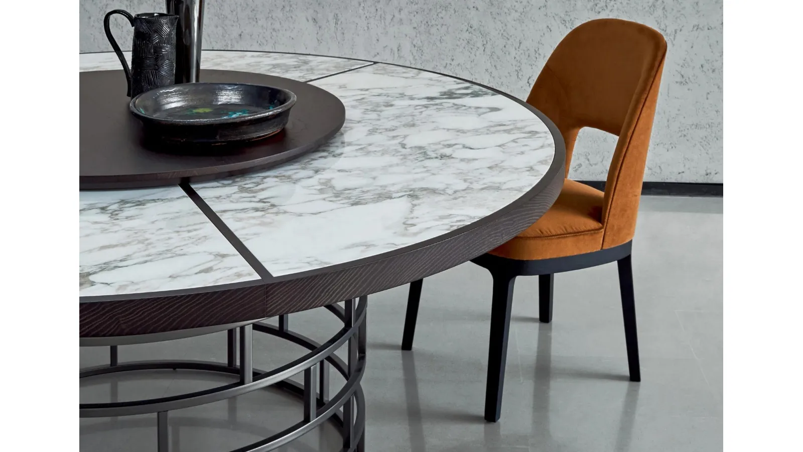 Round table with marble and Crown wood top by Flexform