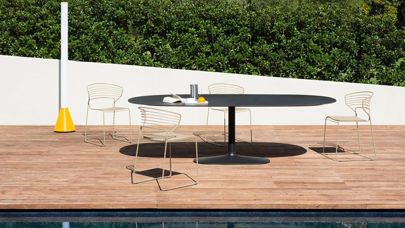 Indoor and outdoor Ellis table with cast iron base and ceramic top by Desalto