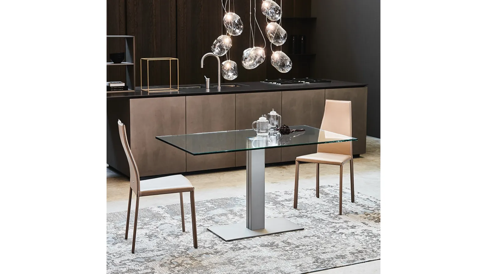 Elvis Table with central steel base and glass top by Cattelan Italia