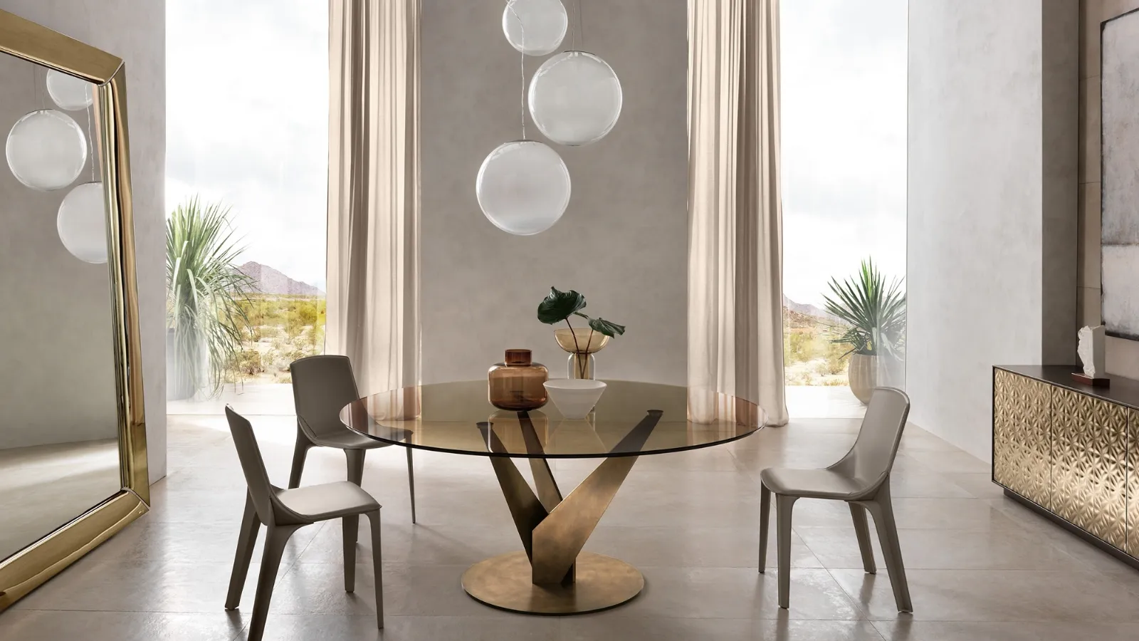 Epsylon round table with bronze glass top and metal base in antique brass finish by Fiam