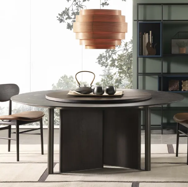 Round In Between table in reconstructed marble by Lema