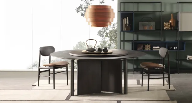Round In Between table in reconstructed marble by Lema