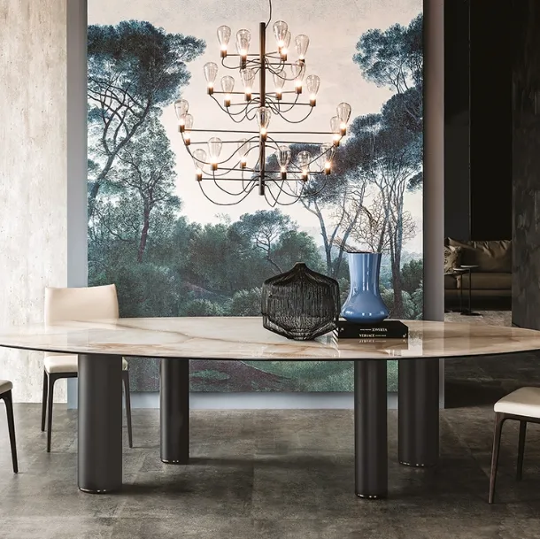 Table with titanium-painted steel legs and an oval ceramic top by Roll Keramik from Cattelan Italia