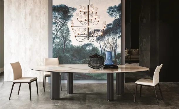 Table with titanium-painted steel legs and an oval ceramic top by Roll Keramik from Cattelan Italia