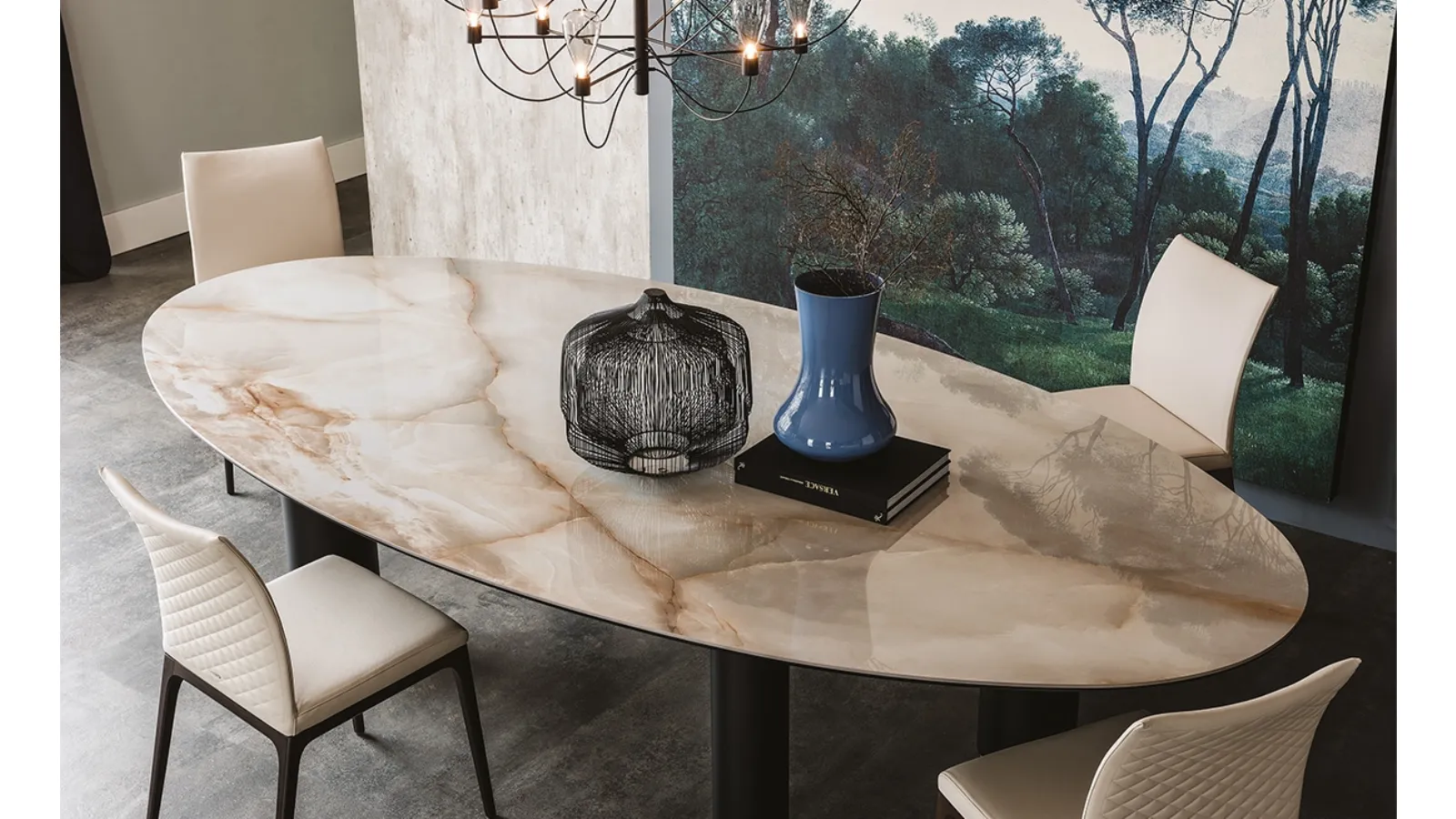 Table with titanium-painted steel legs and an oval ceramic top by Roll Keramik from Cattelan Italia