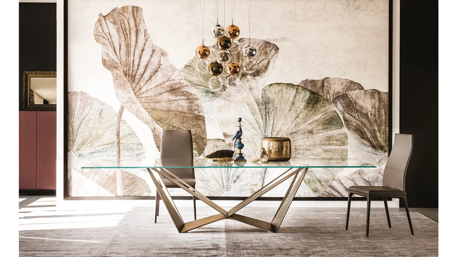 Table with steel base and Skorpio glass top by Cattelan Italia