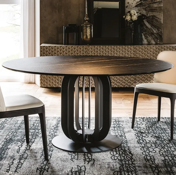 Round table with metal base and Soho Keramik ceramic top by Cattelan Italia