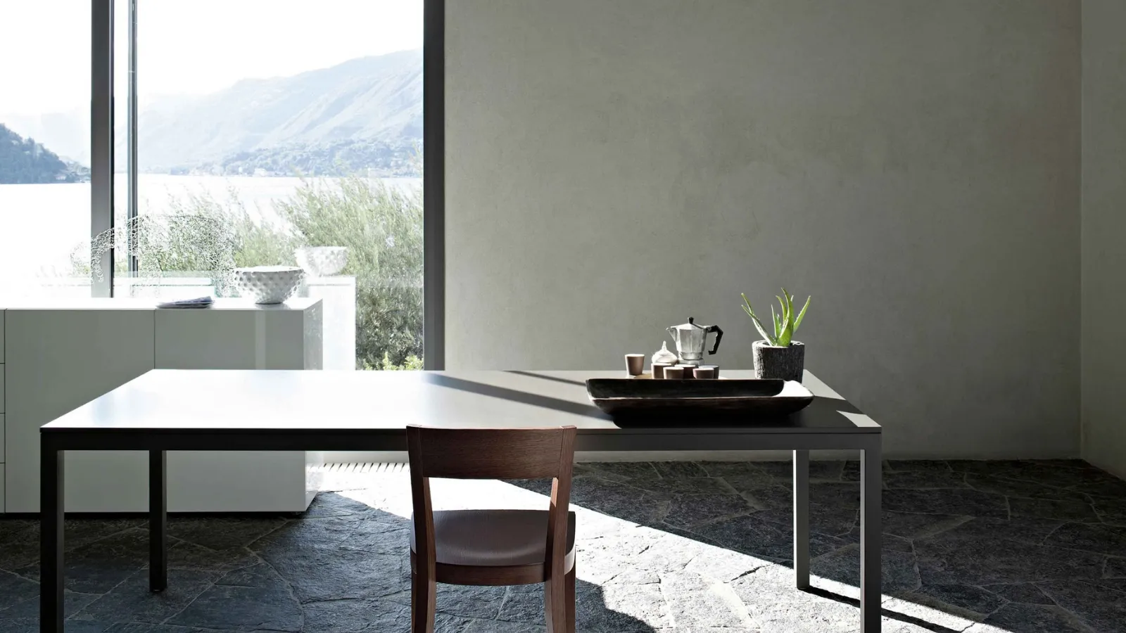 Sosia table with matte lacquered finish by Lema