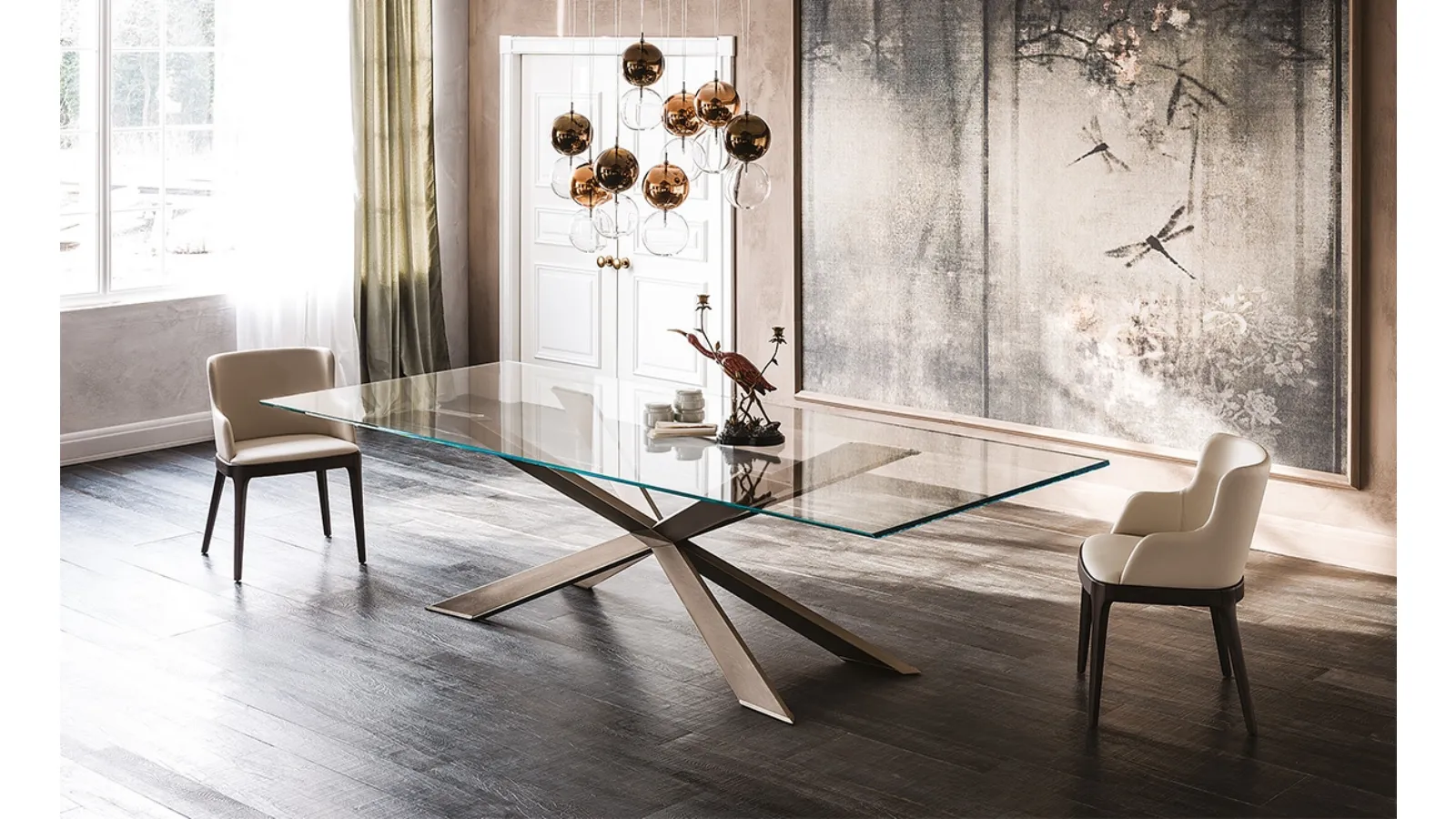 Table with glass top and Spyder steel base by Cattelan Italia