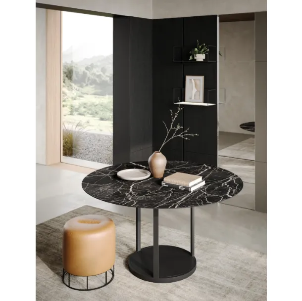 Twirl round table with ceramic top and metal base by Ronda Design