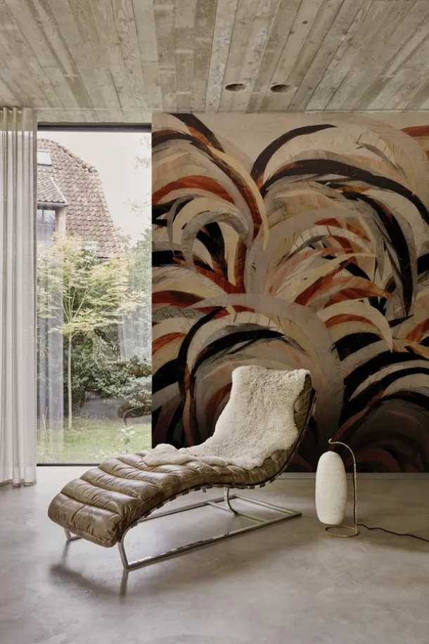 Wallpaper with warm-colored leaves from Cave by Wall&Decò