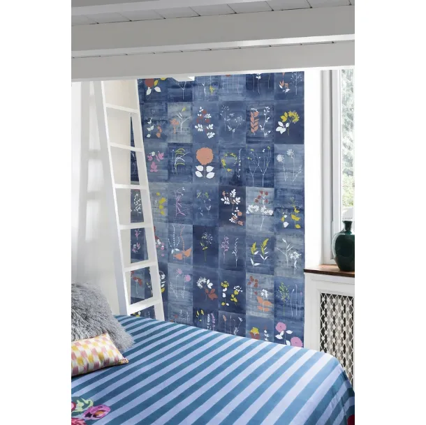 Wallpaper with decorated tiles on a Cyanopop blue background by Wall&Decò