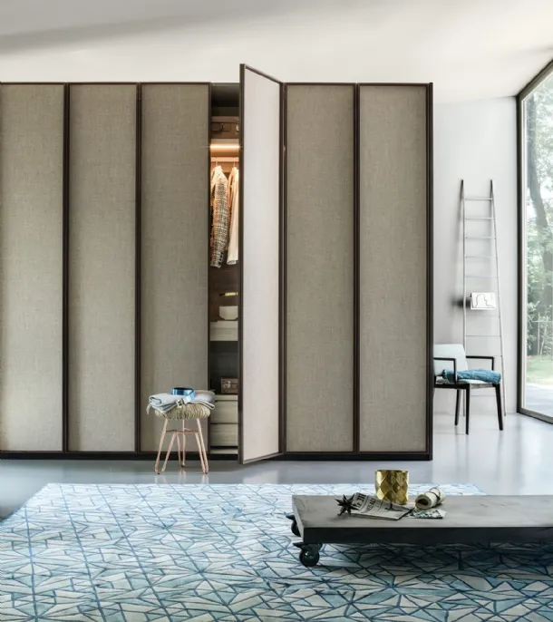 Wardrobe with swing doors upholstered in Lema's Dandy fabric