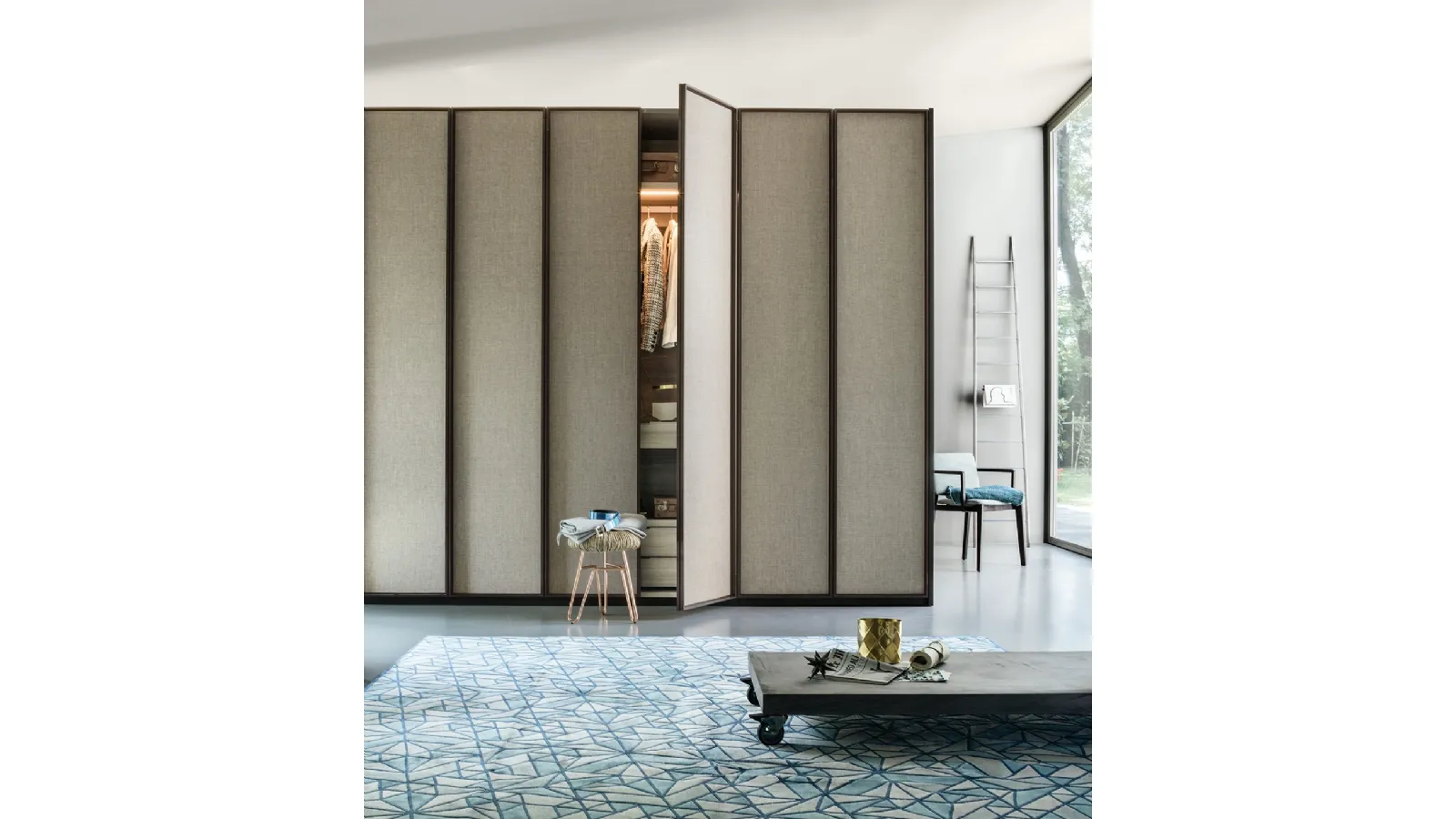 Wardrobe with swing doors upholstered in Lema's Dandy fabric