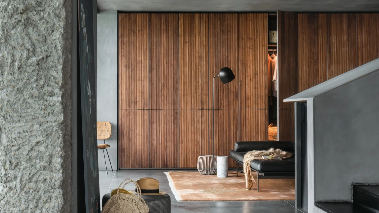 Wardrobe with hinged door Seryasse in solid wood with boiserie effect of Canaletto Walnut slats by Lema
