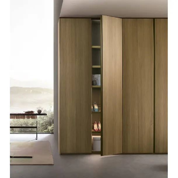 Custom wall wardrobe with hinged door in Lema's Noce Text wood veneer